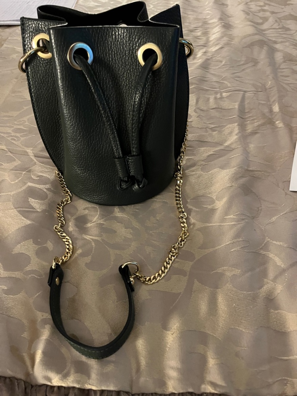 Diva Black Leather Drawstring Bucket Bag with Gold Chain Strap